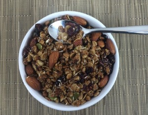 granola in bowl with spoon